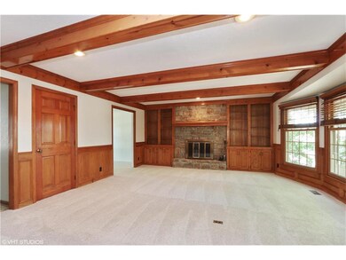 Large, family room overlooks park-like backyard.