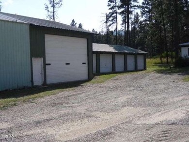 Side View of Shop and Garage Next to Hom