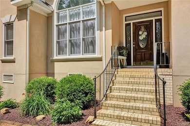 Front Door.  Large front window plus transom and s