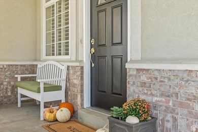 Property entrance with stucco siding