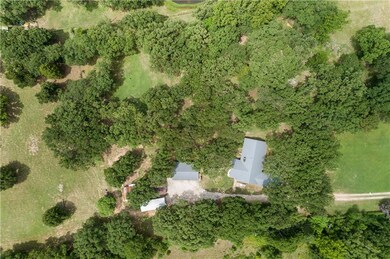 Aerial view of the main house and some of the outb