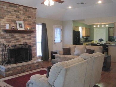 Den open to the kitchen