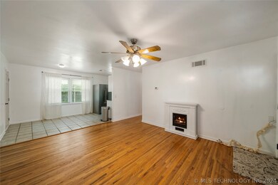 Living room looking into kitchen
