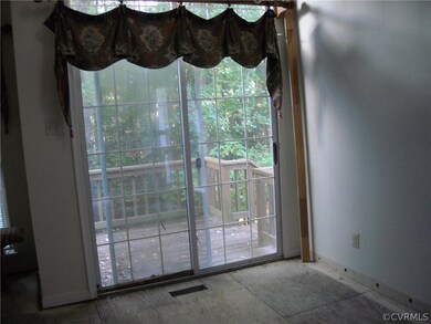 Dining room with sliding door to deck.