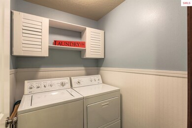 The laundry room is conveniently placed upstairs w