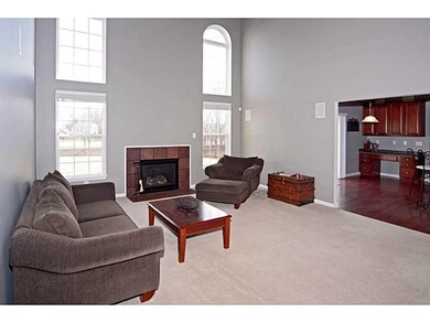 Exterior Front. 2-story Great Room with fireplace.