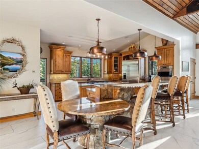 Kitchen dining area with light tile finish floorin