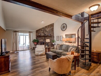 Luxury vinyl flooring, beamed vaulted ceiling and