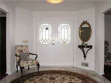 Entry/Foyer. The marble tile entry offers a stylis