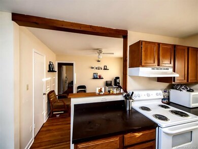 Kitchen has pass through to dining room