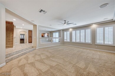 Unfurnished living room with carpet, visible vents