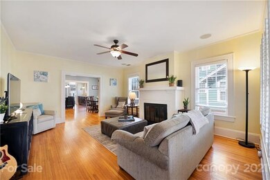 Bright and roomy Living Room with wood-burning fir