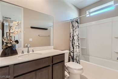 Full bathroom with toilet, vanity, and shower / ba