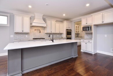 Gorgeous Gourmet Kitchen with Double Ovens.  Photos are from a different Community Model but Similar Floor-plan.