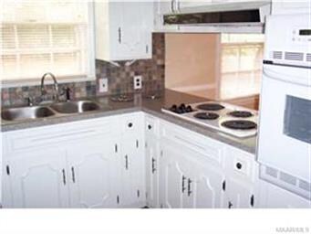 The new counter tops and backsplash in the kitchen