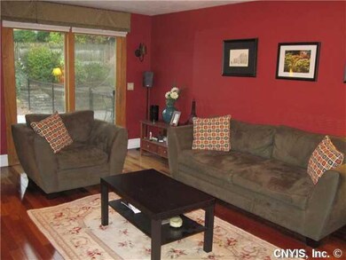 Living Room. Sliders exit to pool/patio area.  Not