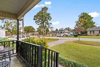 Balcony featuring covered porch