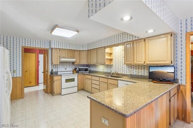 The cabinets have a hand rubbed finish and provide ample storage for your kitchen essentials.