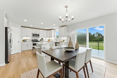 Kingston floorplan, ready Dec 2025! Photo of similar home. Colors, styles and selections will vary.