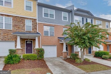 View of front of house featuring concrete driveway