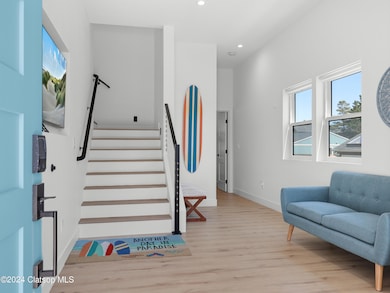 Entryway - Laminate plank flooring.