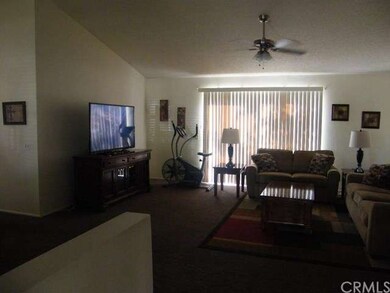 Living room with sliding door to backyard