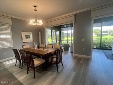 Dining room with a notable chandelier, ornamental