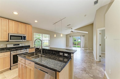 Stainless Appliances including gas stove, granite counter tops