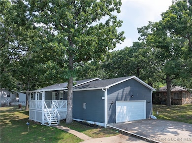 Inviting Covered Front Porch 2 Car Garage
