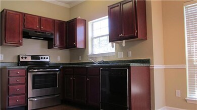 Large Kitchen has beautiful cherry cabinetry