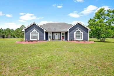Featuring excellent curb appeal with new landscapi