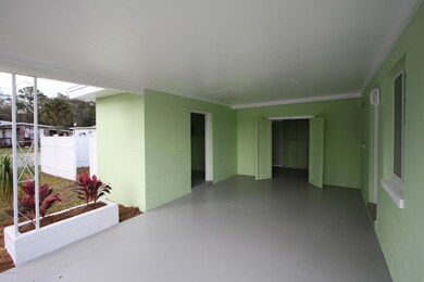Carport w/Storage Room
