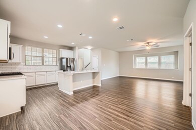 Kitchen featuring stainless steel appliances, dec