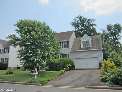 Exterior Front - Garage, Paved Drive.