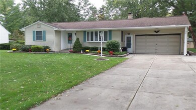 Extra wide concrete driveway with a turn around pa