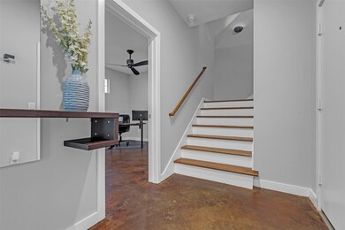 As you step inside, a welcoming foyer sets the ton