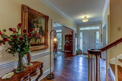 Featuring 9' smooth ceiling, hardwood floor, custo
