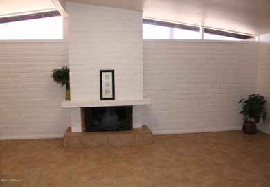 awesome fireplace w/exposed brick!