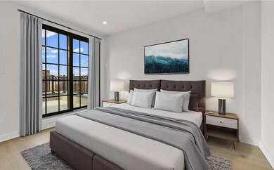 Bedroom with light hardwood / wood-style floors