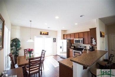Open plan with living area adjacent to kitchen.