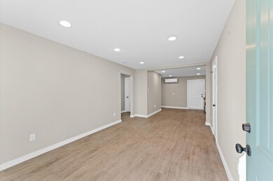 Recessed lighting throughout creating a bright and
