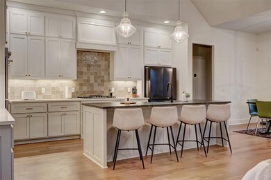 Kitchen featuring stainless steel appliances, whit