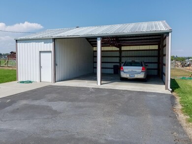 2car carport with shop attached
