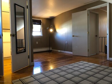 Bedroom with walk-in closet