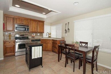 Stylish upgraded kitchen with custom cabinetry, gr
