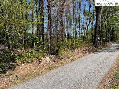City maintained road with utilities to the lot (Lo