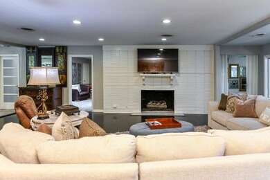 The Living room is very large and features a mason