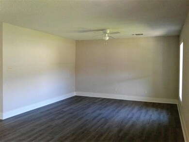 Huge living area with fresh paint and all new floo