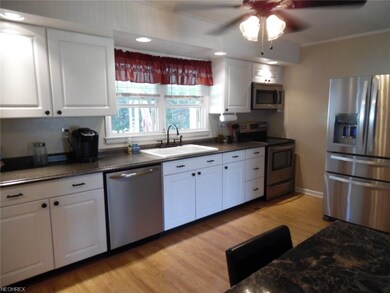 Kitchen with all stainless steel appliances.