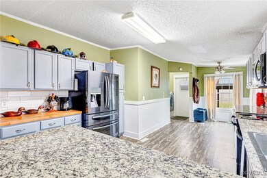 Kitchen with appliances with stainless steel finis